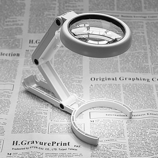 Hand magnifying lamp